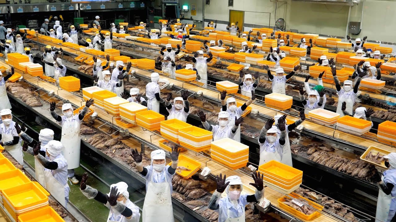 Laura working long hours at a factory